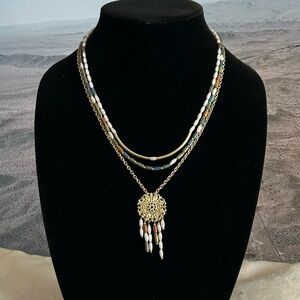 Gold Layered Necklace with Pendant and Tassels